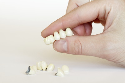 Dentures on a hand